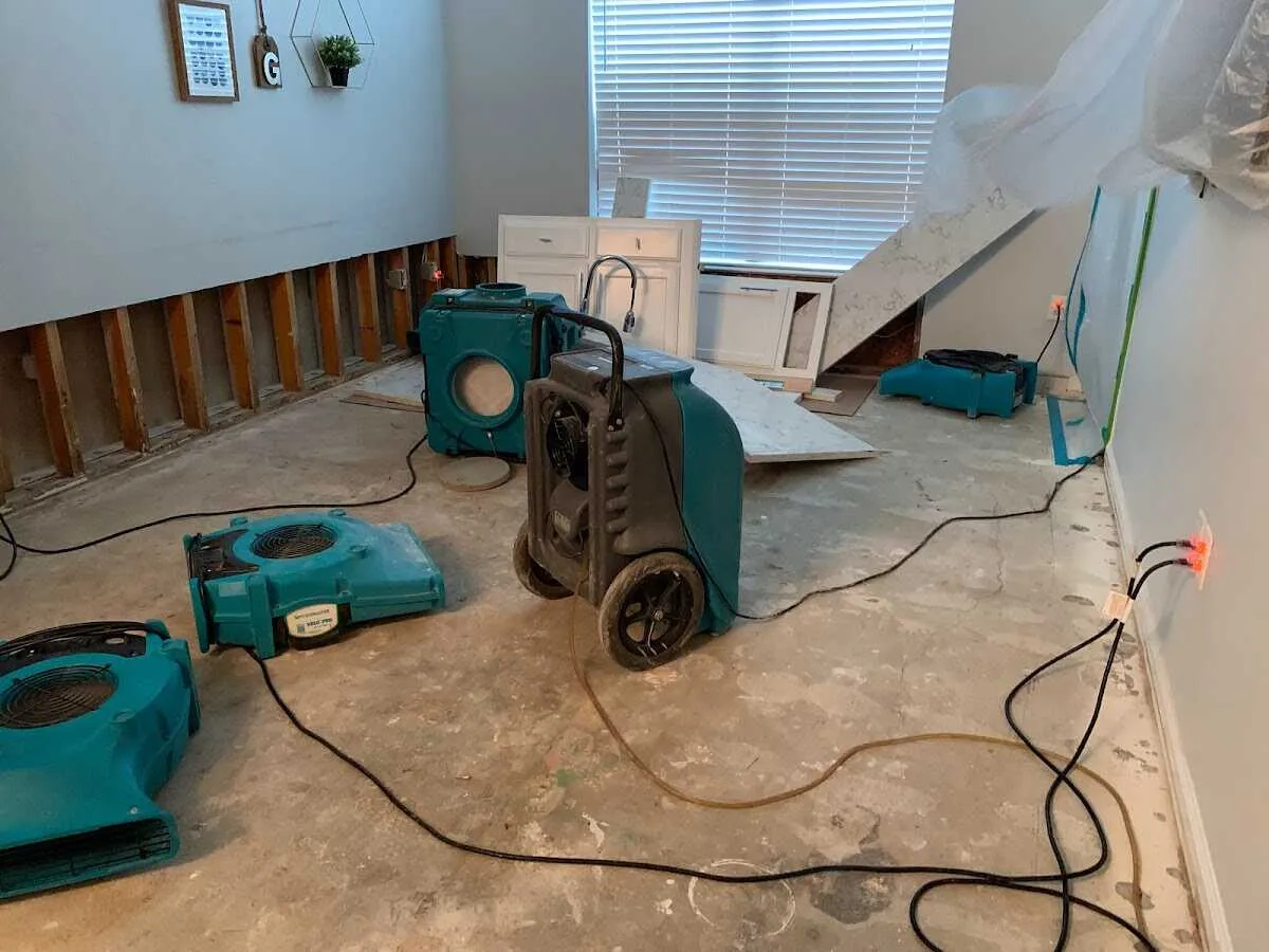 Dehumidifier in flood-cut room for Water Damage Restoration in North St. Paul